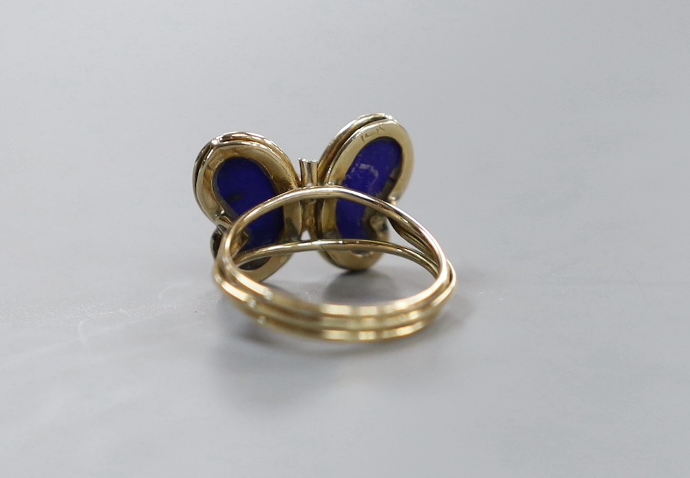A yellow metal, lapis lazuli and diamond set 'butterfly' ring, size I, gross weight 2.6 grams.